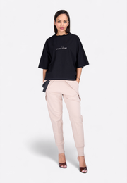 Model wearing oversized cropped black T-shirt, full view – East Vibe